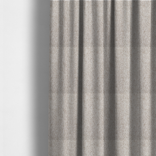 The fabric used to create these made-to-measure curtains is a multi-tonal, textured basket weave in a sophisticated blend of beige, taupe, and off-white yarns.