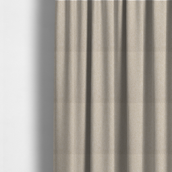 The fabric used to create these made-to-measure curtains is a fabric features a tight, structured basket weave in a soft, warm sand or light tan tone.