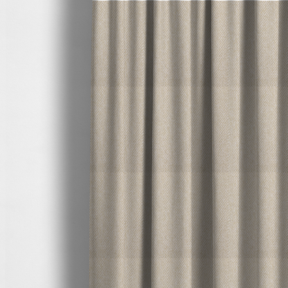 The fabric used to create these made-to-measure curtains is a fabric features a tight, structured basket weave in a soft, warm sand or light tan tone.