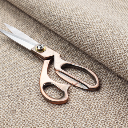 This fabric features a tight, structured basket weave in a sophisticated blend of cool taupe, grey, and off-white yarns.