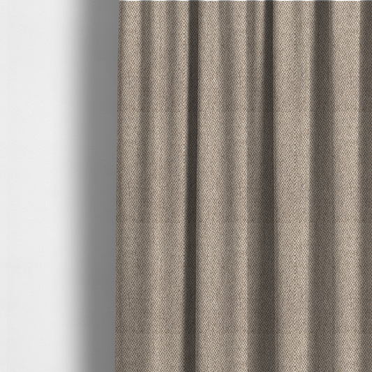 The fabric used to create these made-to-measure curtains is a fabric features a tight, structured basket weave in a sophisticated blend of cool taupe, grey, and off-white yarns.