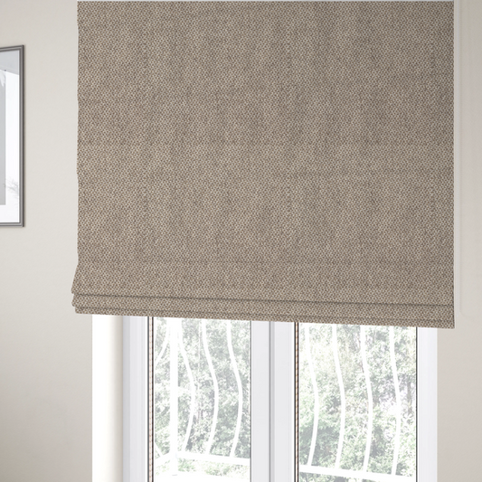 The fabric used to create these Roman blinds is a fabric features a tight, structured basket weave in a sophisticated blend of cool taupe, grey, and off-white yarns.