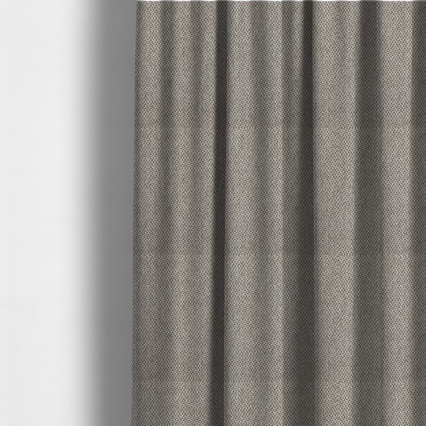 The fabric used to create these made-to-measure curtains is a fabric features a tight, structured basket weave in a versatile, mid-tone grey.