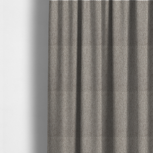 The fabric used to create these made-to-measure curtains is a fabric features a tight, structured basket weave in a versatile, mid-tone grey.