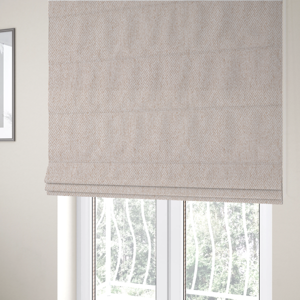 The fabric used to create these Roman blinds is a fabric features a delicate, fine-grained basket weave in a soft, light blush or warm champagne tone.