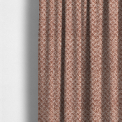 The fabric used to create these made-to-measure curtains is a fabric features a tight, structured basket weave in a warm, muted copper or terra-cotta tone.