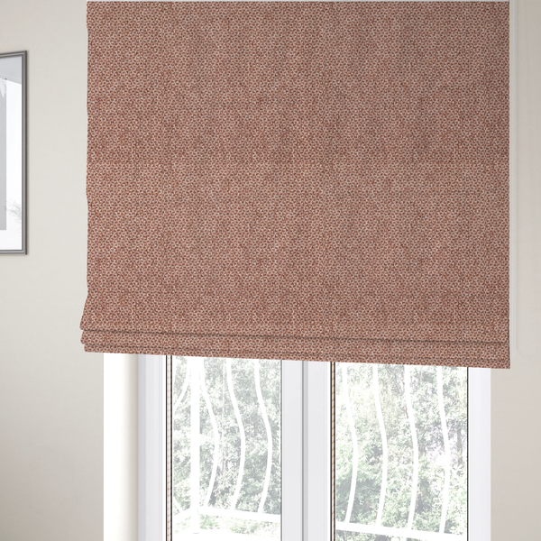 The fabric used to create these Roman blinds is a fabric features a tight, structured basket weave in a warm, muted copper or terra-cotta tone.