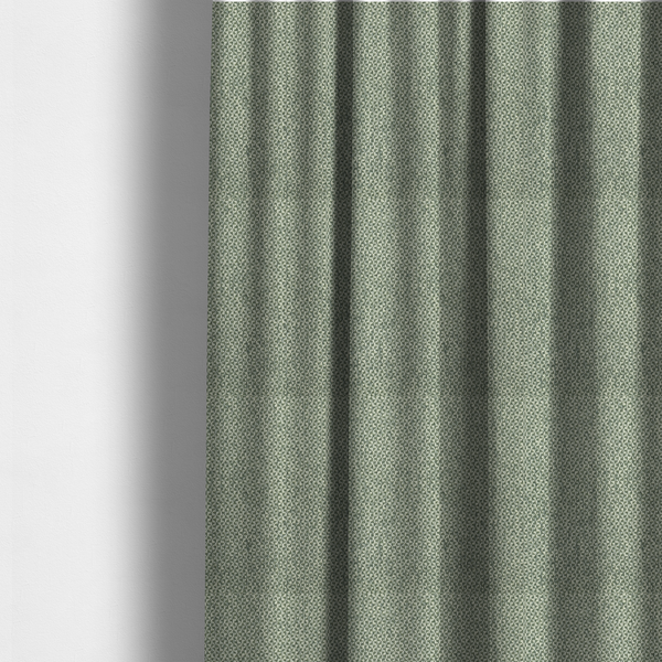 The fabric used to create these made-to-measure curtains is a fabric features a tight, structured basket weave in a soft, muted sage green.