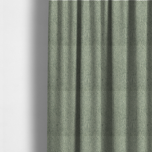 The fabric used to create these made-to-measure curtains is a fabric features a tight, structured basket weave in a soft, muted sage green.