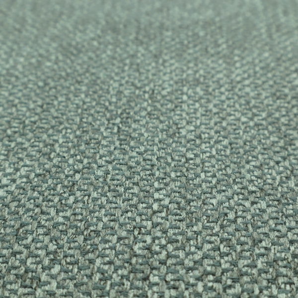 This fabric features a tight, structured basket weave in a vibrant, deep green.