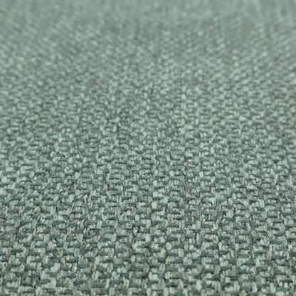 This fabric features a tight, structured basket weave in a vibrant, deep green.