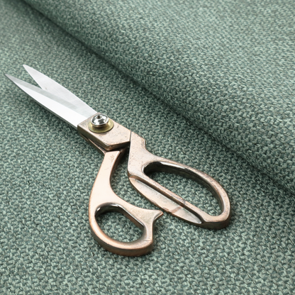 This fabric features a tight, structured basket weave in a vibrant, deep green.