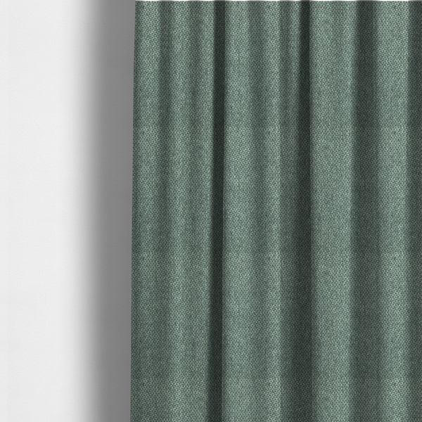 The fabric used to create these made-to-measure curtains is a fabric features a tight, structured basket weave in a vibrant, deep green.