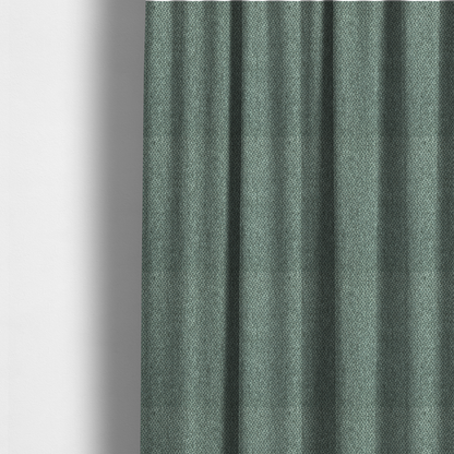 The fabric used to create these made-to-measure curtains is a fabric features a tight, structured basket weave in a vibrant, deep green.