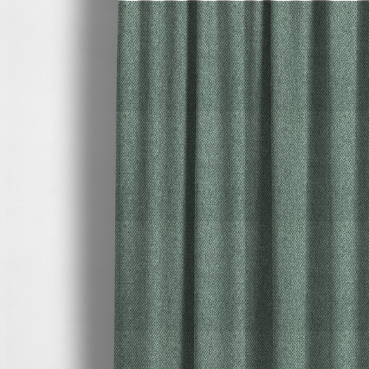 The fabric used to create these made-to-measure curtains is a fabric features a tight, structured basket weave in a vibrant, deep green.