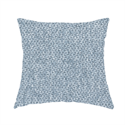 The fabric used to create this handmade cushion is a fabric features a tight, structured basket weave in a soft, cool-toned sky blue.