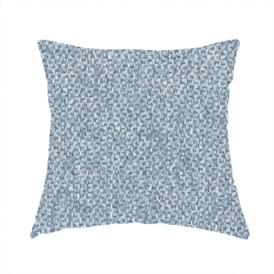 The fabric used to create this handmade cushion is a fabric features a tight, structured basket weave in a soft, cool-toned sky blue.