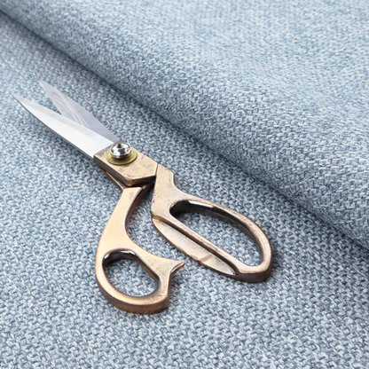 This fabric features a tight, structured basket weave in a soft, cool-toned sky blue.