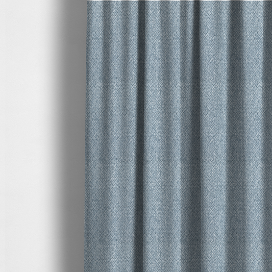 The fabric used to create these made-to-measure curtains is a fabric features a tight, structured basket weave in a soft, cool-toned sky blue.