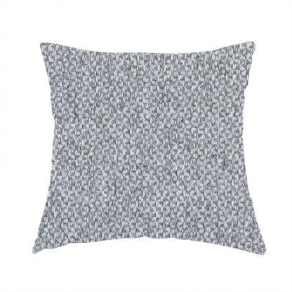 The fabric used to create this handmade cushion is a  fabric features a tight, structured basket weave in a versatile, deep charcoal grey.