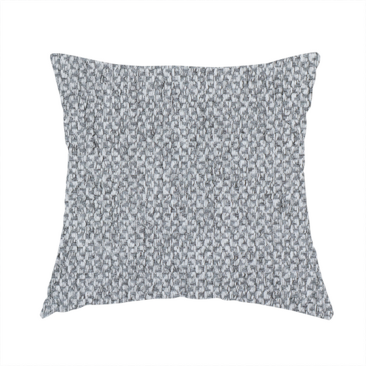 The fabric used to create this handmade cushion is a  fabric features a tight, structured basket weave in a versatile, deep charcoal grey.