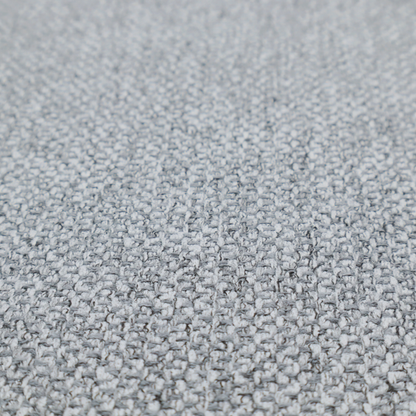 This fabric features a tight, structured basket weave in a versatile, deep charcoal grey.