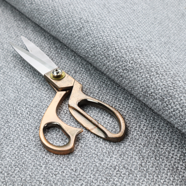This fabric features a tight, structured basket weave in a versatile, deep charcoal grey.