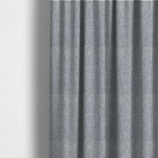 The fabric used to create these made-to-measure curtains is a fabric features a tight, structured basket weave in a versatile, deep charcoal grey.