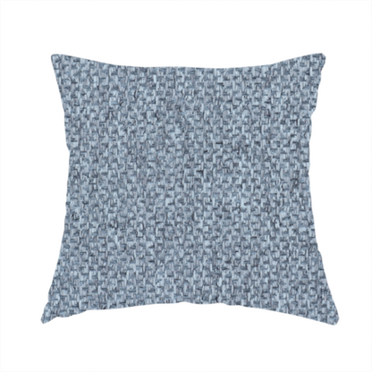 The fabric used to create this handmade cushion is a fabric features a tight, structured basket weave in a versatile, deep steel blue.