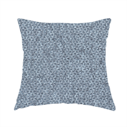 The fabric used to create this handmade cushion is a fabric features a tight, structured basket weave in a versatile, deep steel blue.