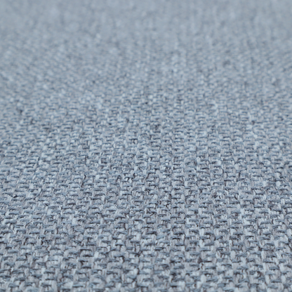 This fabric features a tight, structured basket weave in a versatile, deep steel blue.
