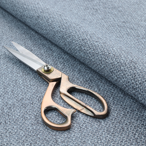 This fabric features a tight, structured basket weave in a versatile, deep steel blue.