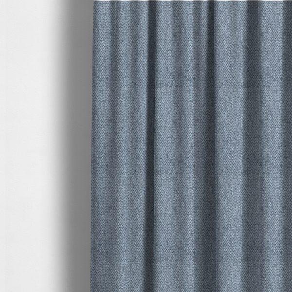 The fabric used to create these made-to-measure curtains is a fabric features a tight, structured basket weave in a versatile, deep steel blue.
