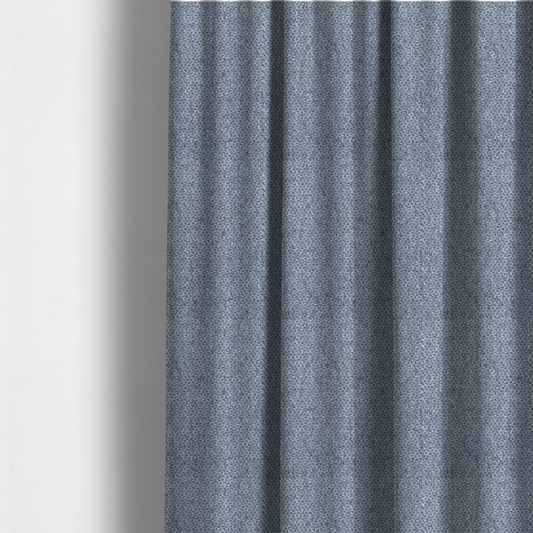 The fabric used to create these made-to-measure curtains is a fabric features a tight, structured basket weave in a versatile, deep steel blue.