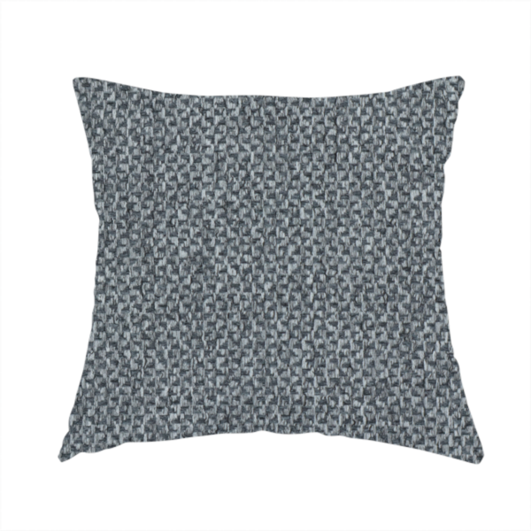 The fabric used to create this handmade cushion is a fabric features a tight, structured basket weave in a versatile, deep charcoal grey.