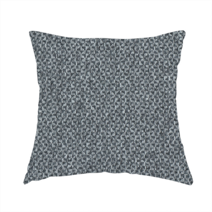 The fabric used to create this handmade cushion is a fabric features a tight, structured basket weave in a versatile, deep charcoal grey.