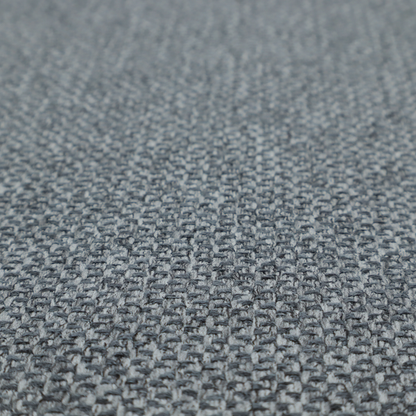 This fabric features a tight, structured basket weave in a versatile, deep charcoal grey.