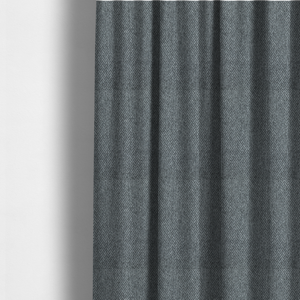 The fabric used to create these made-to-measure curtains is a fabric features a tight, structured basket weave in a versatile, deep charcoal grey.