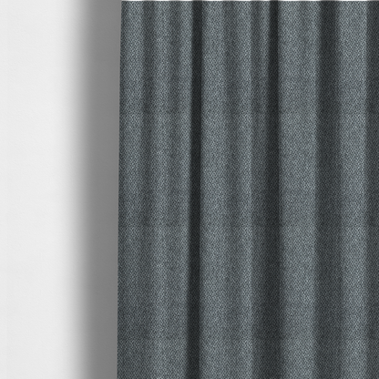 The fabric used to create these made-to-measure curtains is a fabric features a tight, structured basket weave in a versatile, deep charcoal grey.