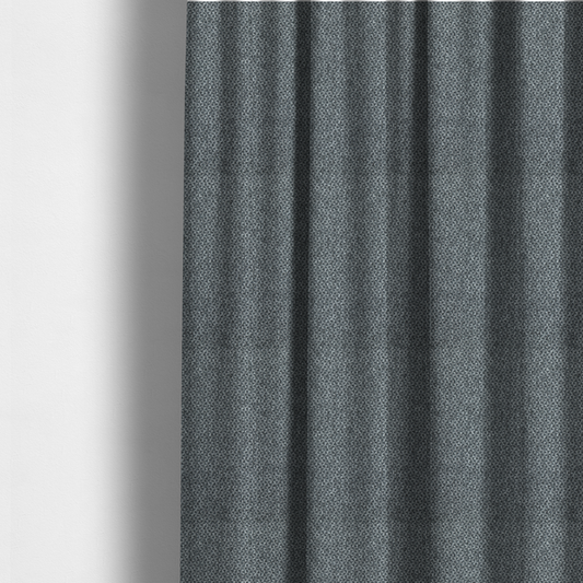 The fabric used to create these made-to-measure curtains is a fabric features a tight, structured basket weave in a versatile, deep charcoal grey.