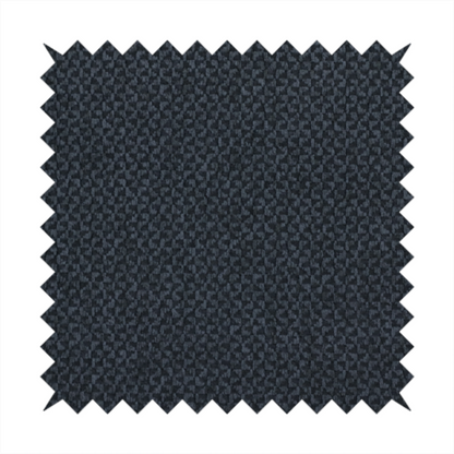 This fabric features a tight, structured basket weave in a deep, moody charcoal or near-black tone.