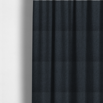 The fabric used to create these made-to-measure curtains is a fabric features a tight, structured basket weave in a deep, moody charcoal or near-black tone.