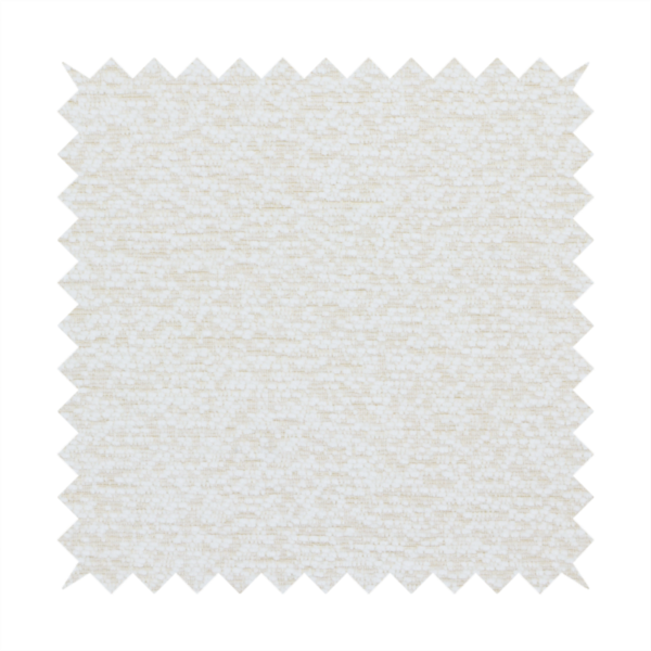A textured, off-white or cream-coloured weave. It has a bouclé-like or chunky, nubby appearance with a slightly irregular, multidimensional surface that gives it a cosy, organic, and tactile quality.
