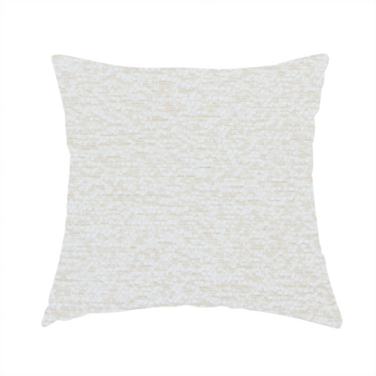 The fabric used to create this handmade cushion is a textured, off-white or cream-coloured weave. It has a bouclé-like or chunky, nubby appearance with a slightly irregular, multidimensional surface that gives it a cosy, organic, and tactile quality.