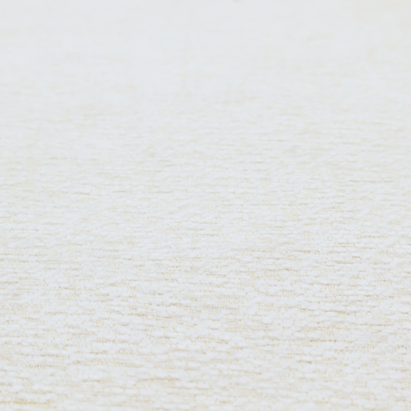 A textured, off-white or cream-coloured weave. It has a bouclé-like or chunky, nubby appearance with a slightly irregular, multidimensional surface that gives it a cosy, organic, and tactile quality.