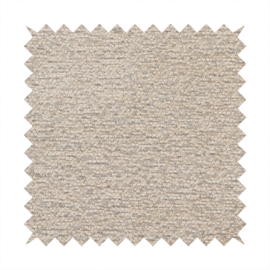 A warm, earthy neutral weave that masterfully blends light cream, tan, and soft grey tones. It has a complex, nubby texture with an intricate, multidimensional surface that feels both substantial and inviting.