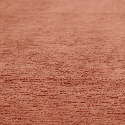 A vibrant, warm terracotta or rust-coloured weave. It features a dense, structured texture with horizontal ribbing and a consistent, slightly nubby finish that adds depth and character.