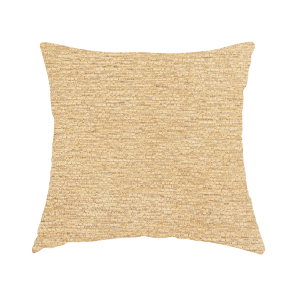 the fabric used to create this handmade cushion is a warm, golden-beige weave with a sophisticated, textured finish. It is crafted with a dense, nubby construction that creates a subtle horizontal ribbing effect, providing both visual depth and a tactile, inviting feel.