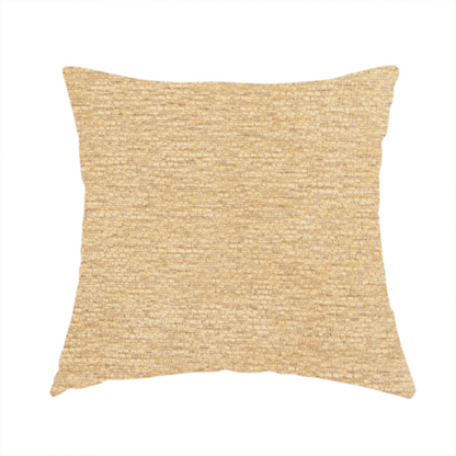 the fabric used to create this handmade cushion is a warm, golden-beige weave with a sophisticated, textured finish. It is crafted with a dense, nubby construction that creates a subtle horizontal ribbing effect, providing both visual depth and a tactile, inviting feel.
