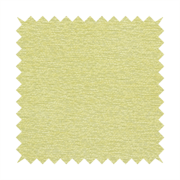 a fresh, vibrant chartreuse-green weave with a sophisticated, textured finish. It is crafted with a dense, nubby construction that creates a subtle horizontal ribbing effect, providing both visual dimension and a soft, inviting tactile quality.